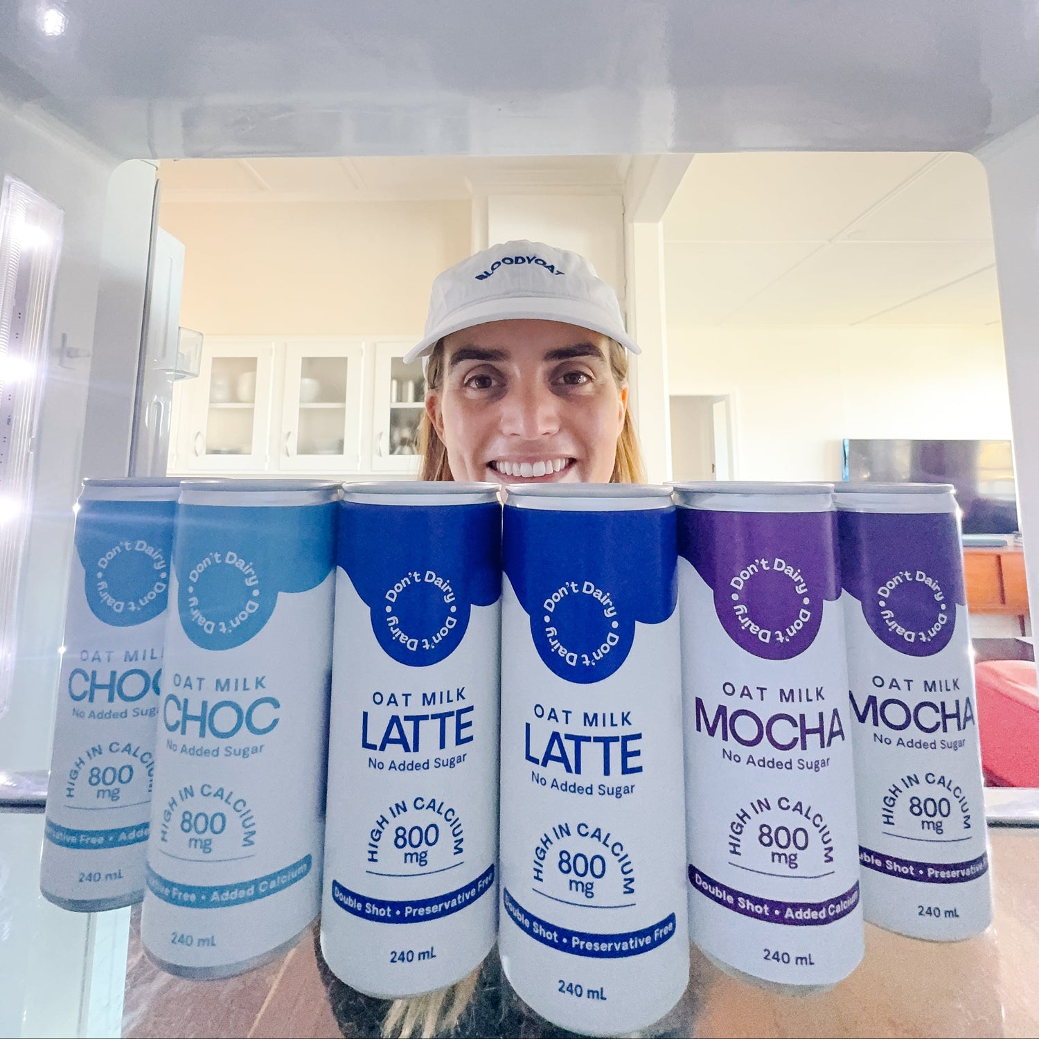 stef-crowley-clough-dont-dairy-founder-with-canned-oat-milk-coffee